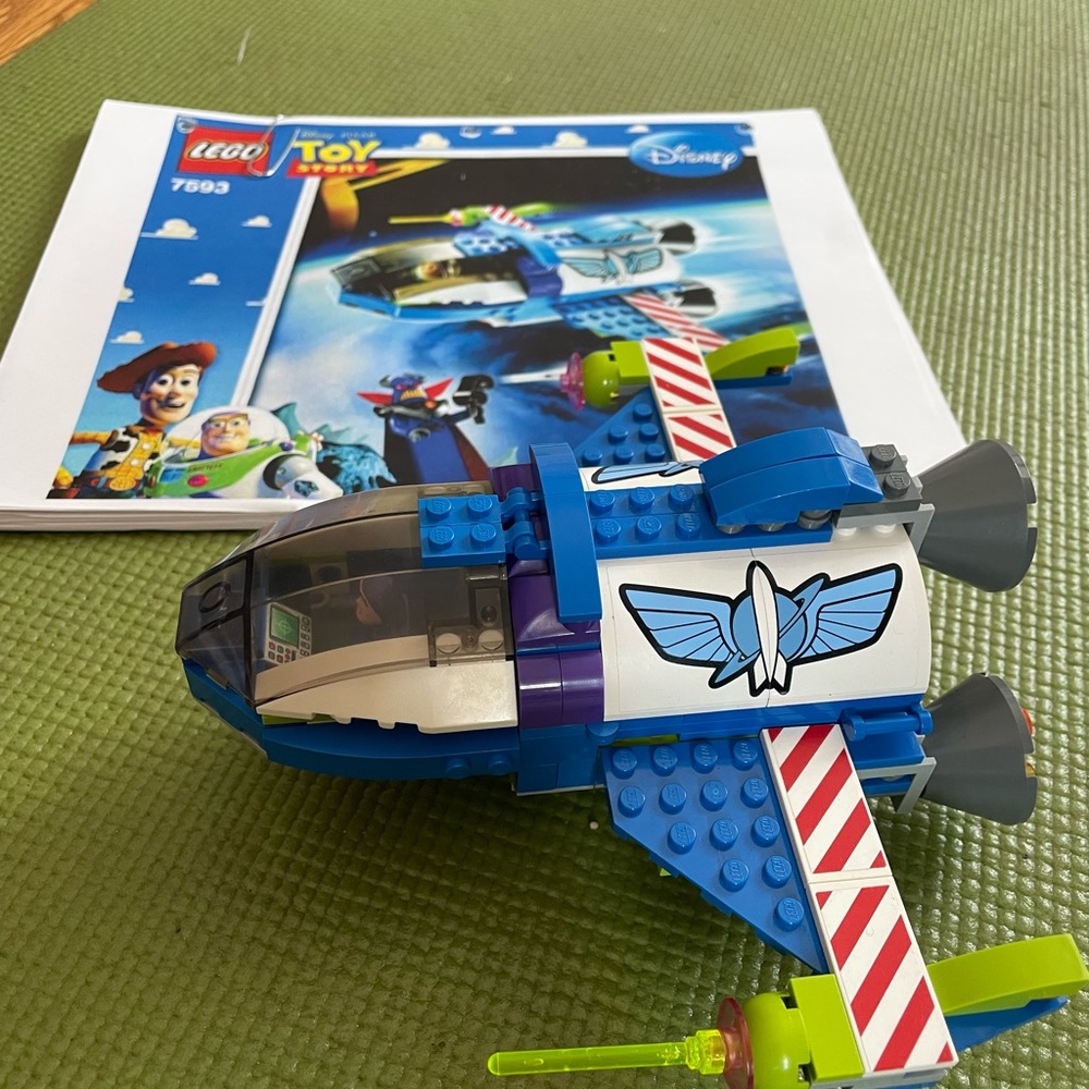 2 Lego sets- Lego Toy Story buzz’s star command and dirt bike transporter